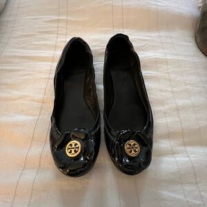 Tory Burch Black Flats with Gold Medallion